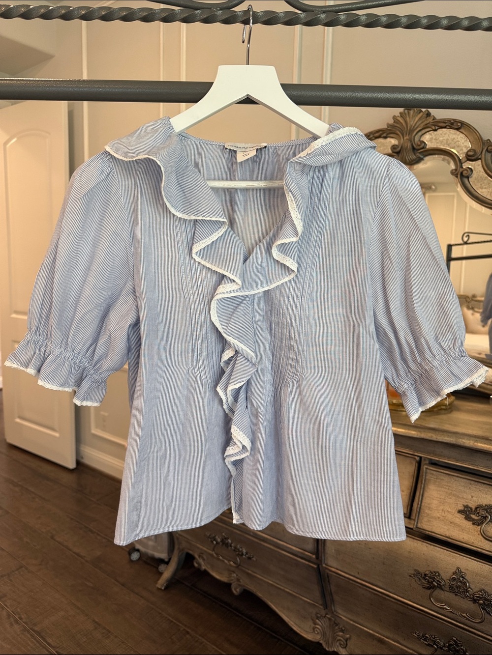 cupcakes & cashmere Light Blue Ruffle Front Blouse